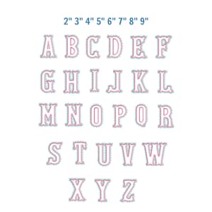 May include: A set of pink letters with a scalloped blue border, ranging in size from 2 to 9 inches. The letters are in a serif font and are arranged in rows, with the alphabet displayed from A to Z.