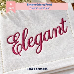 Pode incluir: Um quadrado de tecido branco com a palavra Elegant bordada em cursivo rosa escuro. O texto Embroidery Font 6 Sizes 2,54 cm, 3,81 cm, 5,08 cm, 6,35 cm, 7,62 cm, 8,89 cm está no topo e +BX Formats é visível na parte inferior.