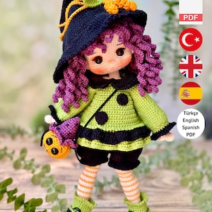 May include: A crochet doll pattern featuring a character with purple curly hair, wearing a black witch hat with orange accents, a lime green long-sleeved top with black polka dots, black shorts, and orange and white striped socks with green boots.