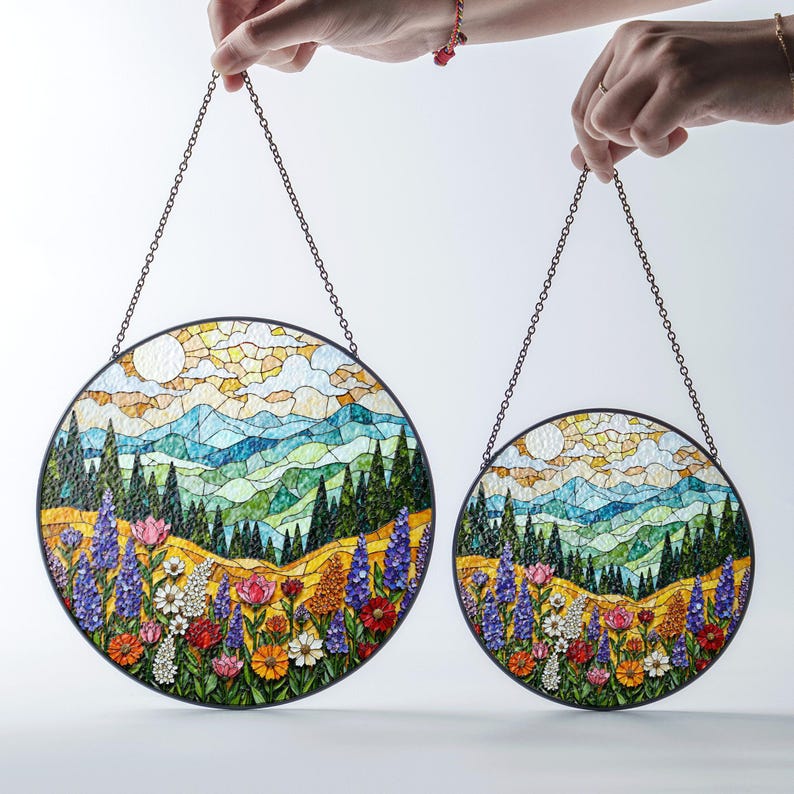 a pair of stained glass hanging from chains
