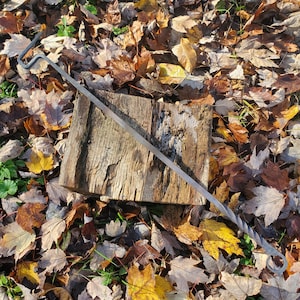 hand forged stainless steel fire rake/poker. Blacksmith Made fire pit tools