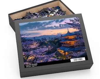 May include: A puzzle box featuring a Japanese pagoda at dusk, surrounded by cherry blossoms. The box is open, revealing puzzle pieces. The box reads "11x14 Puzzle 252 pcs Ages 9+". The puzzle measures 28 x 36 cm.