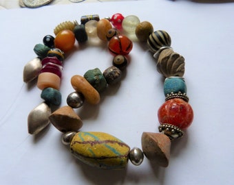 African Necklace with Bodom Glass Bead, Ghana, antique carnelian Pema Raka bead, clay spindle whorls,  Mali