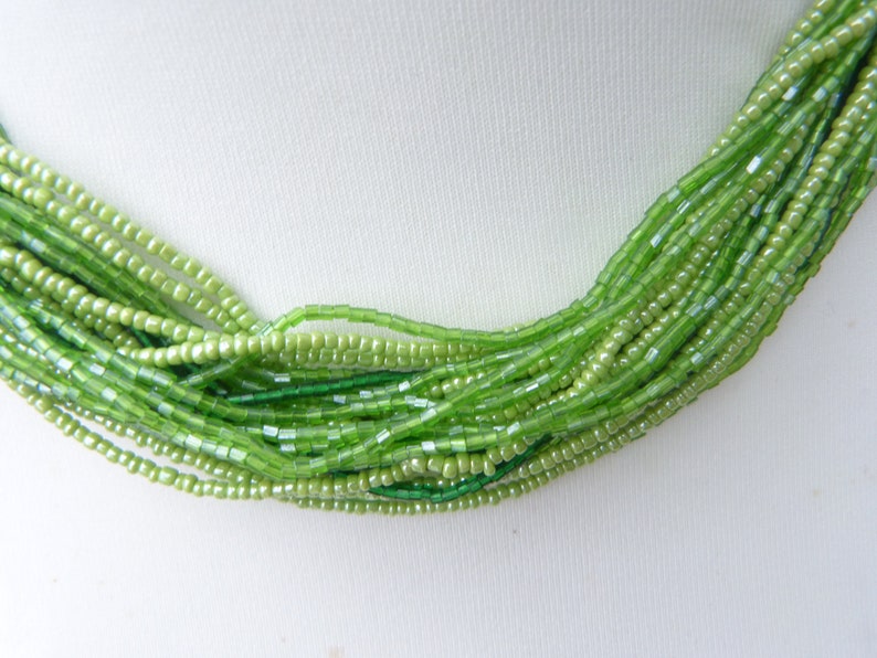 Vintage 1980s multistrand green glass seed bead necklace India 30 strands