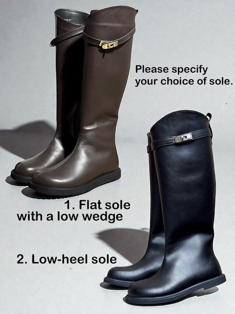 May include: A pair of dark brown knee-high boots and a pair of black knee-high boots, both featuring a decorative strap with a gold-tone metal buckle. Text reads: Please specify your choice of sole. 1. Flat sole with a low wedge. 2. Low-heel sole.