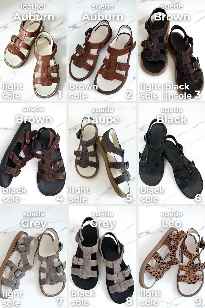 May include: A collection of suede sandals in various colors, including auburn, brown, taupe, black, and grey. Each pair features a strap design with buckles and a light or black sole. The sandals are displayed on a white surface.