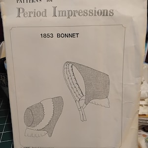 May include: A black and white sewing pattern for a 1853 bonnet. The pattern is titled "Patterns for Period Impressions" and the pattern number is 817. The copyright is 1990 Period Impressions.