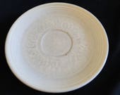 Beige or Ivory Fiesta 6 inch plate or saucer - 6 quot diameter - Stamped on back GENUINE fiesta H-LO USA