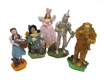 Vintage David Grossman "Wizard Of Oz" Figurines Featuring Dorothy, The Scarecrow, The Tin Man, The Cowardly Lion, and Glinda, Collectible