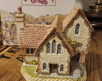 May include: A detailed miniature cottage figurine with a brick roof and stone walls. The cottage has multiple arched windows and a small chimney. The base is green, and the figurine is part of the "David Winter Cottages" collection.