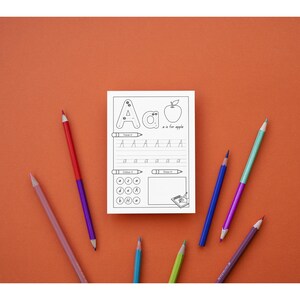 May include: A black and white printable worksheet for learning the letter A. The worksheet includes a dotted letter A, a lowercase letter a, an apple, and a line for tracing the letter A. The text "a is for apple" is written below the apple. There are also spaces for practicing writing the letter A and a section for drawing.