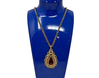 Sierlijke goudkleurige filigraan druppelvormige hanger ketting rood amberglas