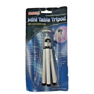 May include: A FamilyMaid brand mini table tripod with extendable legs in original retail packaging. The tripod features a silver head and white legs. The packaging text indicates an adjustable height of 12cm to 20cm and a multi-positional head.