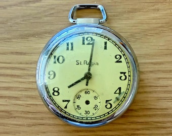 Reparación de piezas de reloj de bolsillo St Regis antiguo. Falta la corona y la manecilla. Tal cual.