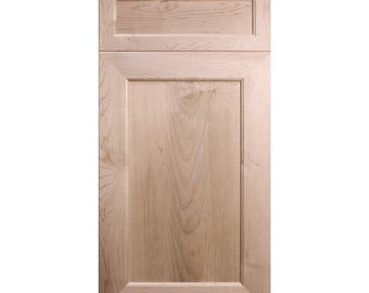 May include: A light wood cabinet door with a raised panel and a single, smaller raised panel above it.