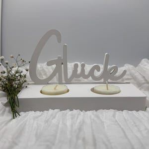 Lucky lettering on candle holder, tealight holder