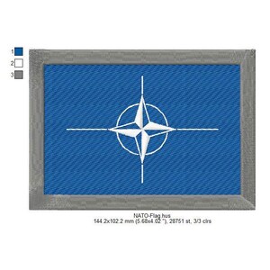 May include: A blue embroidered patch featuring a white star compass design. The patch is bordered in grey and has the text "NATO-Flag.hus 144.2x102.2 mm (5.68x4.02 "), 28751 st, 3/3 clrs" at the bottom.