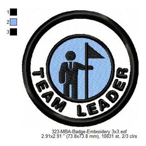 May include: Embroidered patch with the words "TEAM LEADER" in black, surrounding a light blue circle. Inside the circle, a black figure holds a flag. The patch measures 73.8 x 73.8 mm.