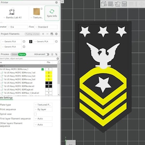 May include: A black and yellow US Navy Chief Petty Officer rank insignia. The emblem features a white eagle, three white stars, and yellow chevrons. The image is a screenshot from a 3D printing software interface.