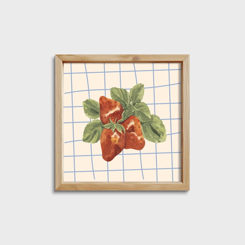 May include: A framed illustration of three red strawberries with green leaves on a blue and white checkered background.