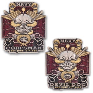 May include: Two metal Navy Corpsman and Devil Doc pins. Each pin features a skull with wings, a snake, and the text "NAVY". The Corpsman pin reads "CORPSMAN EST. JUNE 17TH 1898". The Devil Doc pin reads "DEVIL DOC EST. JUNE 17TH 1898".