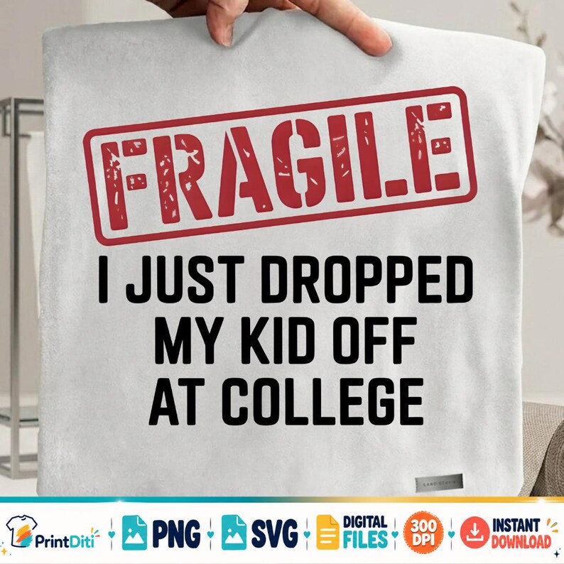 May include: A white blanket featuring a red rectangular stamp graphic with the word FRAGILE in distressed lettering. Below the stamp, black text reads: I JUST DROPPED MY KID OFF AT COLLEGE. The blanket has a soft, plush texture and a small rectangular tag.