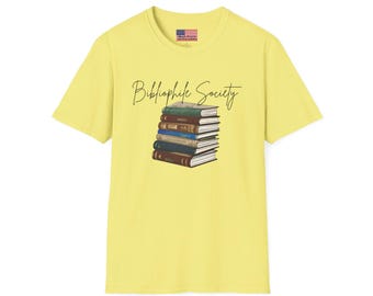 May include: Yellow t-shirt with a stack of books and the text "Bibliophile Society" printed on the front.