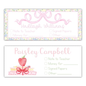 May include: Two personalized school stationery cards. The top card features a pink bow and the name "Hadleigh Williams". The bottom card has an apple and the name "Paisley Campbell". Both cards have checkboxes for notes, money, and signed papers.