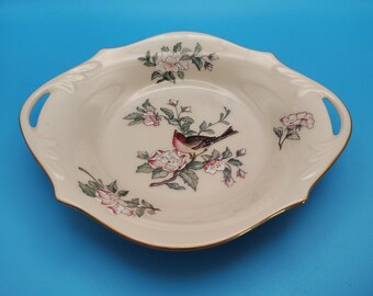 Vintage Lenox “Serenade” shallow serving bowl featuring the classic bird and floral motif on ivory porcelain with elegant 24K gold trim.