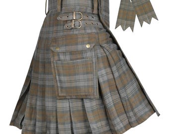 May include: A grey and brown plaid kilt featuring a pleated design, a large cargo pocket with gold-toned snap buttons, and two adjustable side straps with metal buckles. The garment includes a pair of matching pointed-tip kilt flashes.