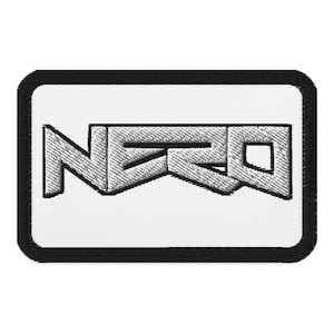 May include: White embroidered patch with the word "NERO" in a stylized font.
