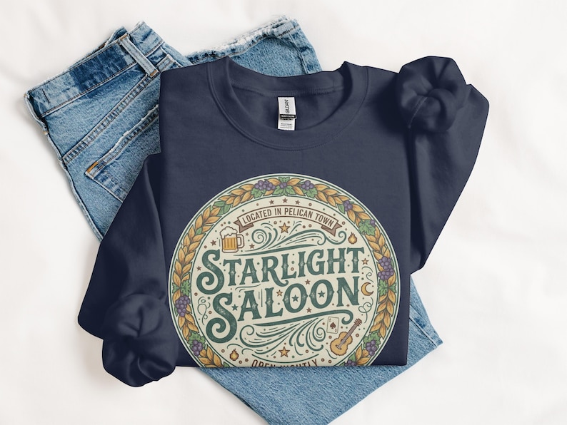 Starlight Saloon T-Shirt, Retro Graphic Tee, Vintage Style Shirt, Pelican Town Tee, Gift for Gamers, Cozy Gaming Apparel, Unisex Fit