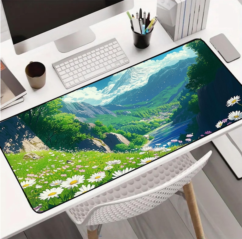 a computer desk with a computer on top of it