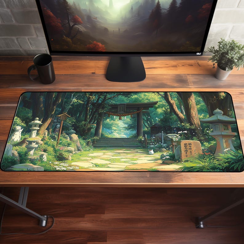 a computer monitor sitting on top of a wooden desk