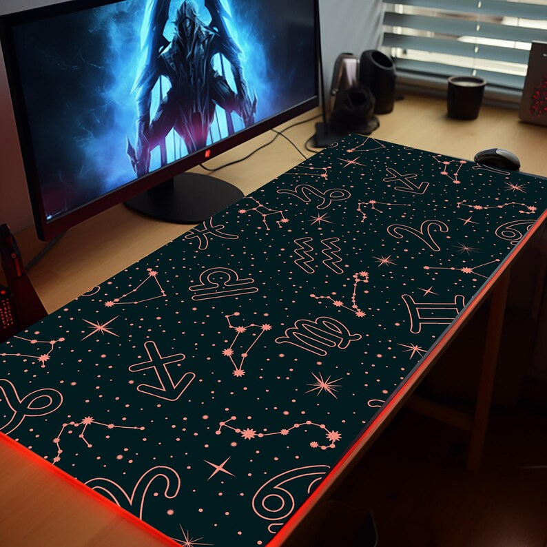 a computer desk with a computer monitor and a large screen