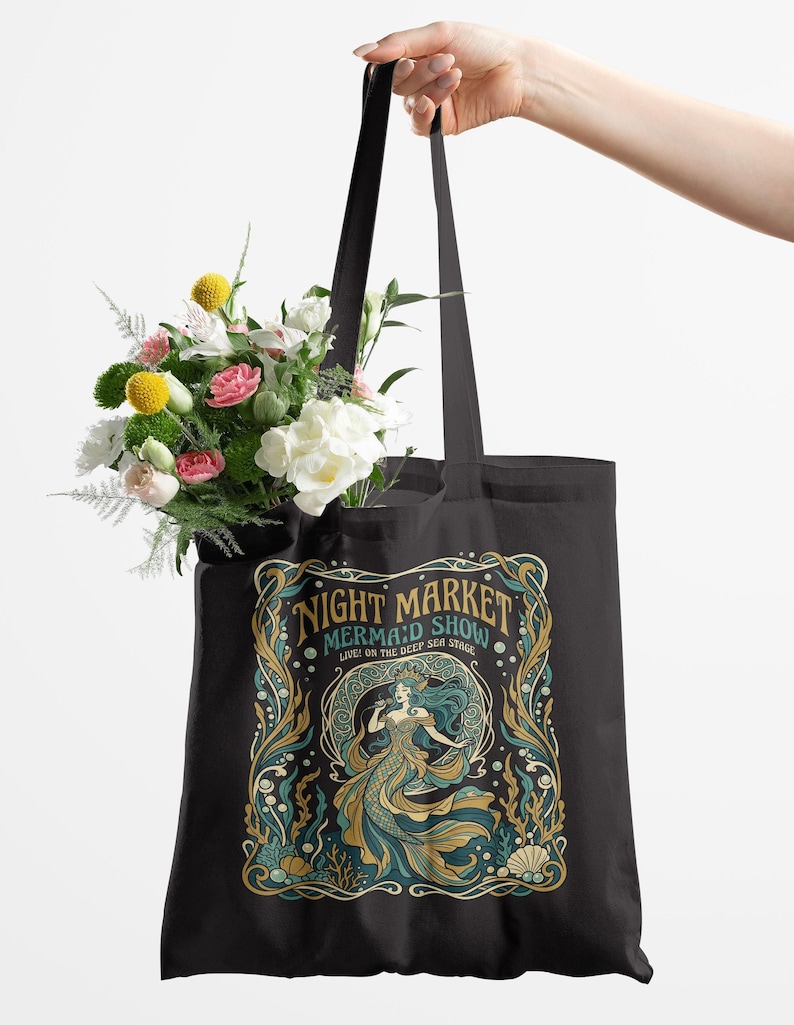 Tote bag with "Night Market Mermaid Show" design featuring a mermaid.