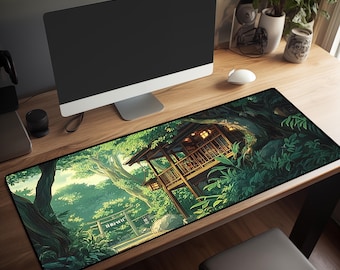 May include: A green and brown mousepad with a cartoon image of a wooden house in a forest. The house has a thatched roof and a porch with a railing. The forest is lush and green with tall trees and ferns.