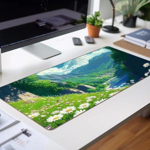 a computer desk with a computer monitor and a mouse pad
