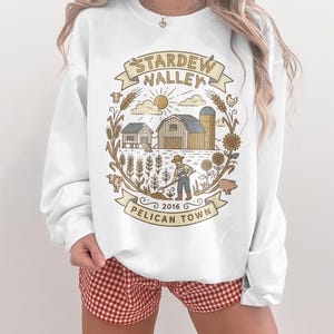 Stardew Valley Sweatshirt, Pelican Town Farm Shirt, Farmer Gaming Crewneck, Indie Game Apparel, Cozy Stardew Valley Fan Gift
Stardew Valley