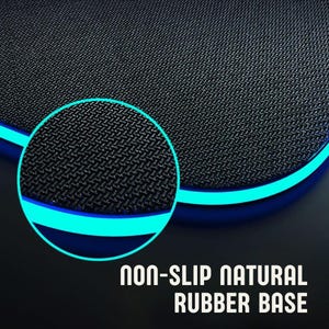 a close up of a black surface with a blue light