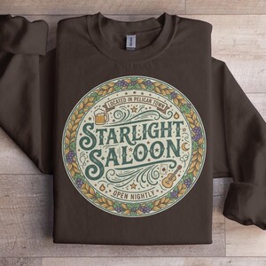 Starlight Saloon hoodie, vintage bar design sweatshirt, cozy pullover, Pelican Town graphic, casual wear, unique gift idea