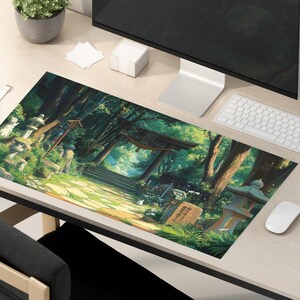 a computer desk with a mouse and keyboard on it