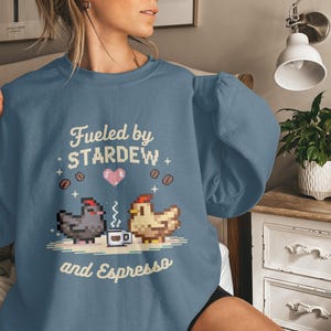 Fueled by Stardew and Espresso sweatshirt, Stardew Valley fan gift, cozy gaming apparel, pixel art hoodie for gamers