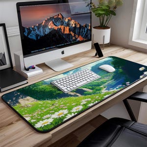 a computer desk with a keyboard and mouse pad