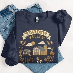 Stardew Valley Sweatshirt, Cozy Farm Game Tee, Gamer Gift, Cute Farmer Art, Harvest Moon Aesthetic, Pixel RPG Shirt, Gaming Apparel
Stardew