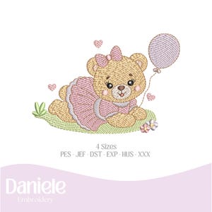 May include: Embroidered design of a brown teddy bear wearing a pink dress and holding a purple balloon. The bear is sitting on a green patch of grass with pink hearts and flowers.