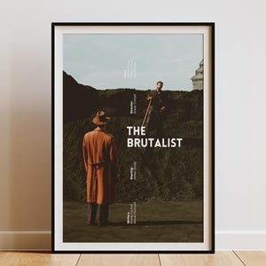 May include: A movie poster for the film "The Brutalist" featuring two men standing in front of a pile of dirt. The poster is black and white with a minimalist design.