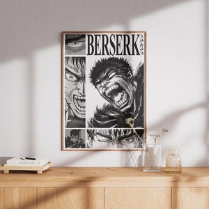 May include: Black and white poster featuring a character from the anime series Berserk. The character is shown with a fierce expression and a sword in hand. The poster has the title "Berserk" in bold white letters.