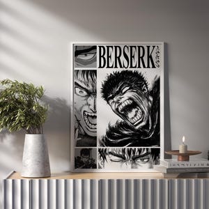 May include: Black and white print of a manga character with the text "Berserk" in a white frame. The character has a fierce expression and is shown with a large mouth and sharp teeth.