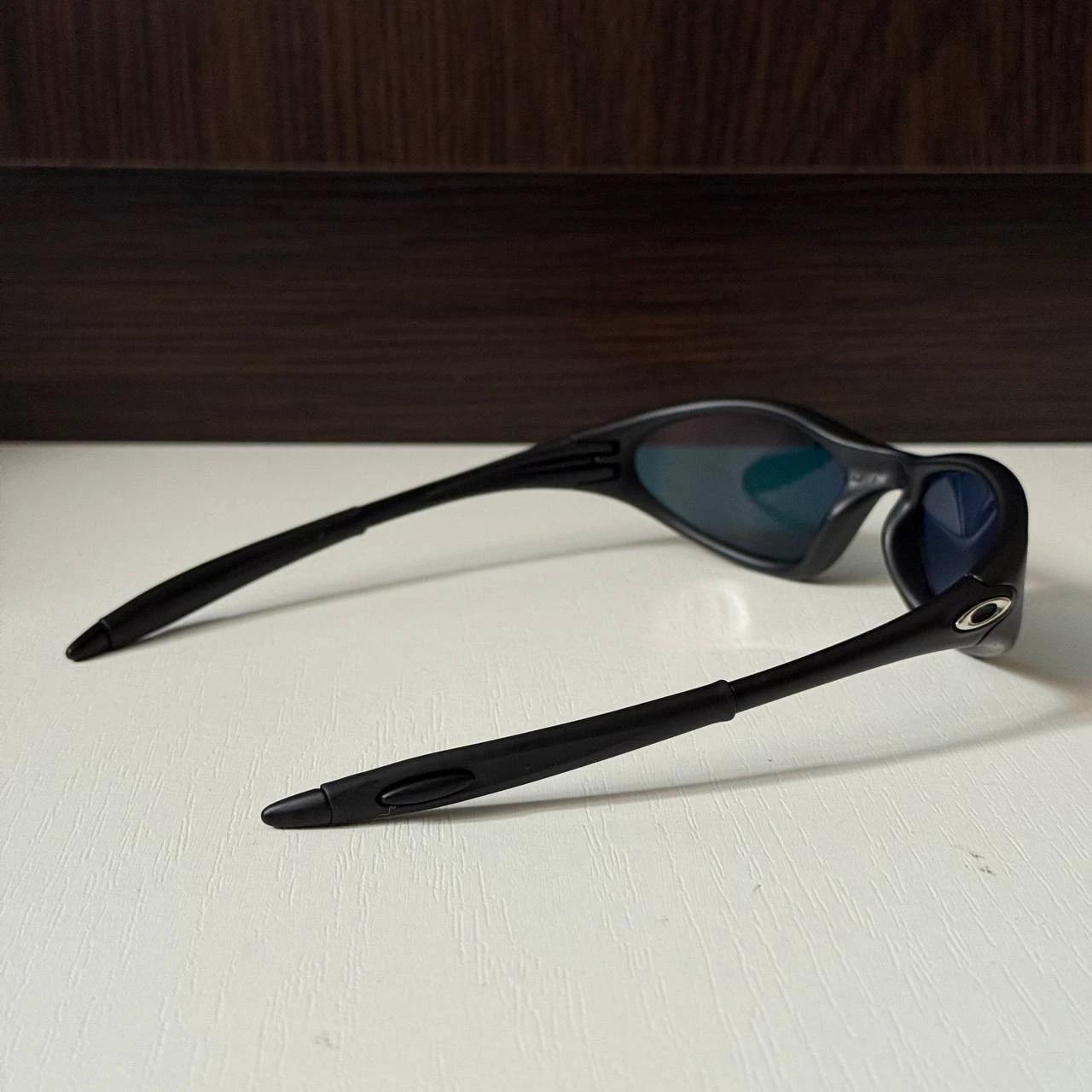 Oakley Minute 1.0 Black Sunglasses Red Iridium Lenses Gorpcore